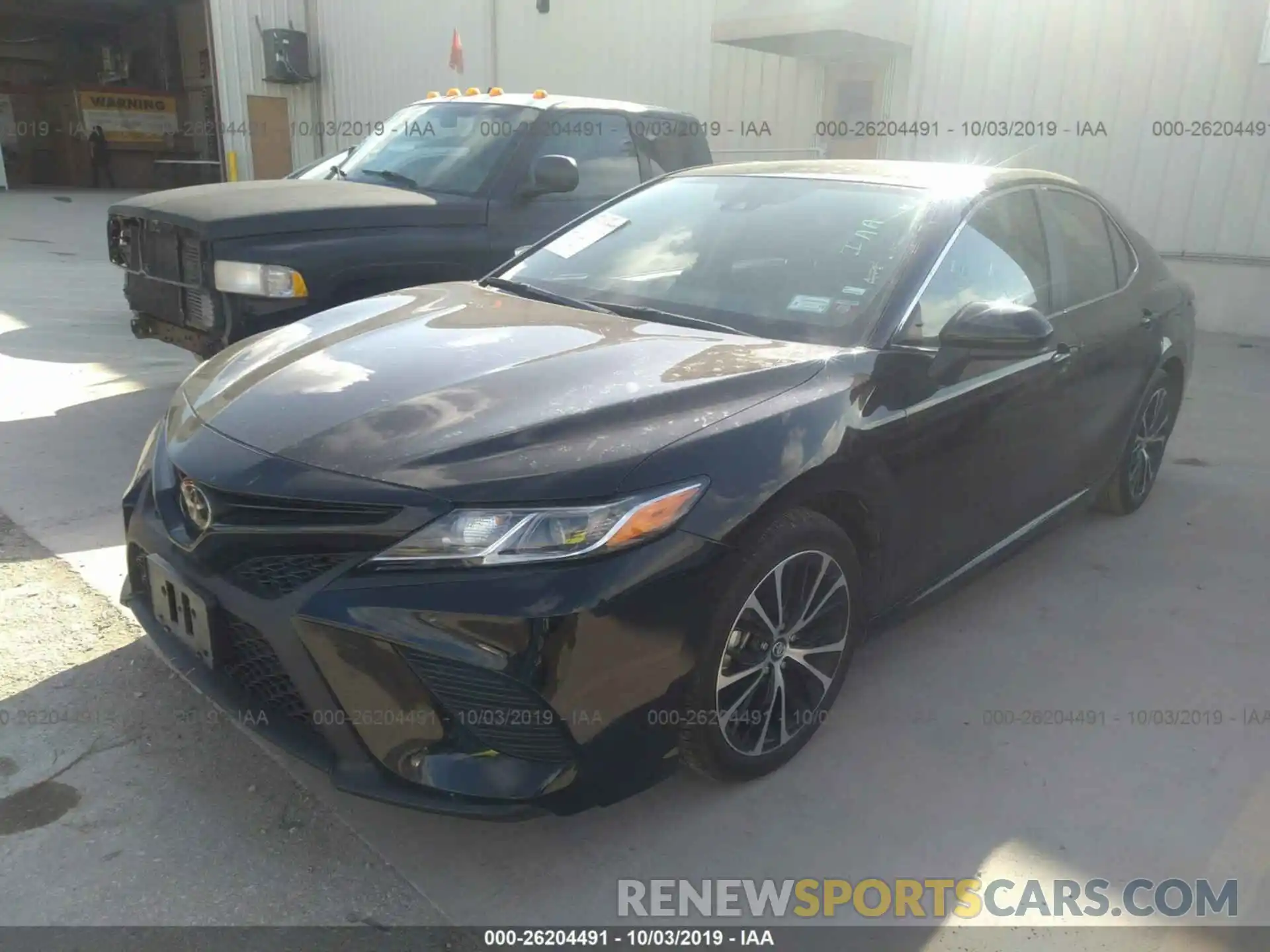 2 Photograph of a damaged car 4T1B11HK0KU758171 TOYOTA CAMRY 2019