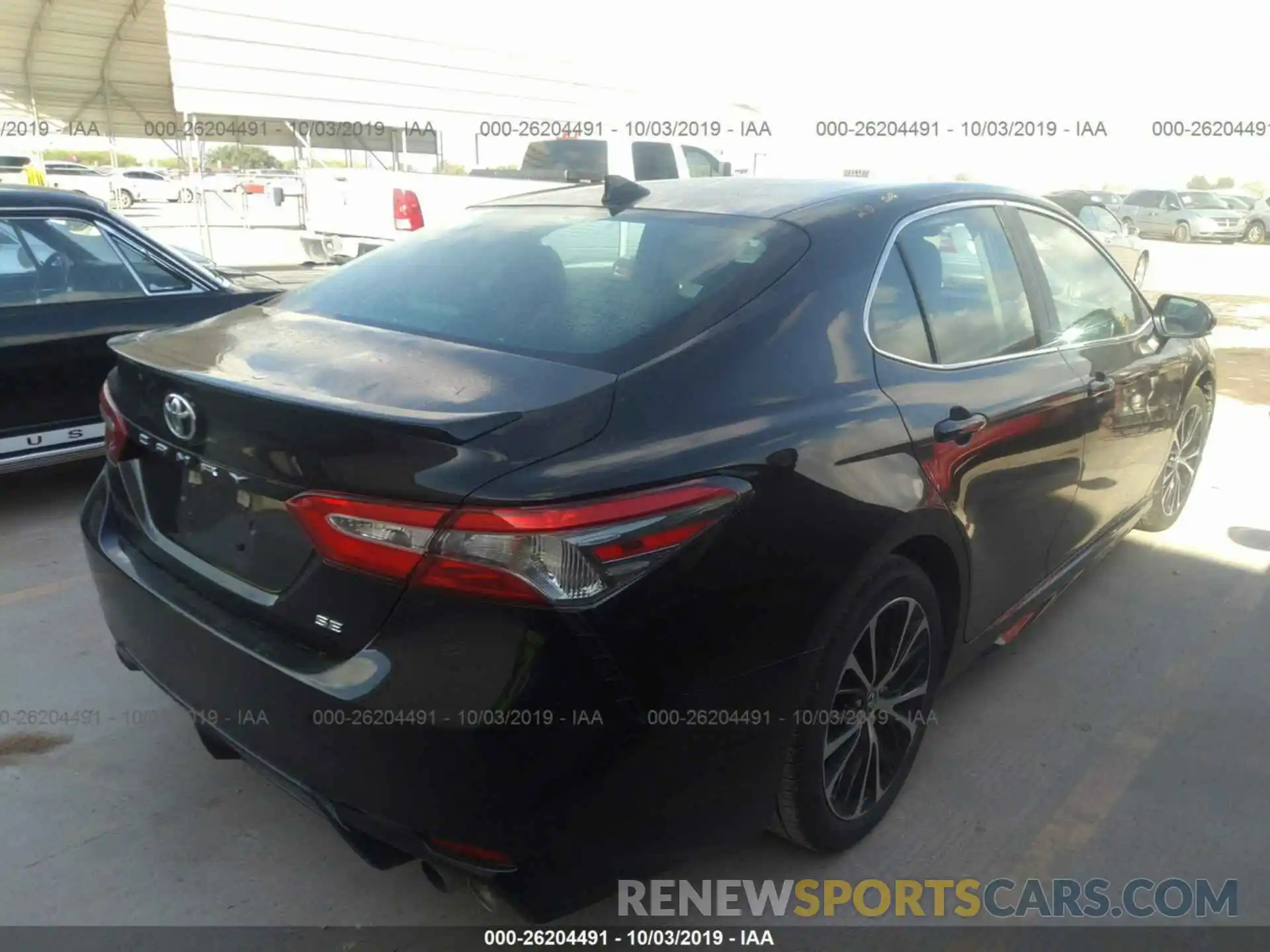 4 Photograph of a damaged car 4T1B11HK0KU758171 TOYOTA CAMRY 2019