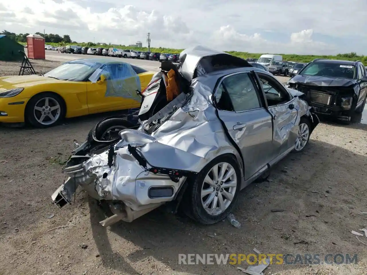 4 Photograph of a damaged car 4T1B11HK0KU759840 TOYOTA CAMRY 2019