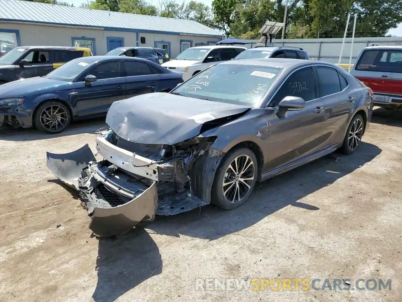 2 Photograph of a damaged car 4T1B11HK0KU760793 TOYOTA CAMRY 2019