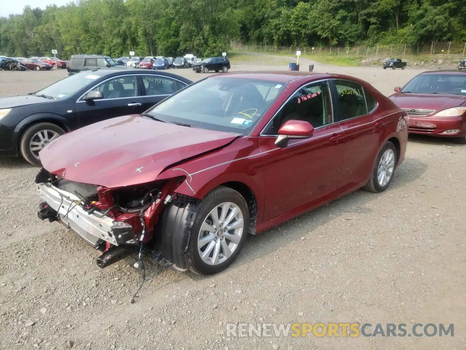 2 Photograph of a damaged car 4T1B11HK0KU760986 TOYOTA CAMRY 2019