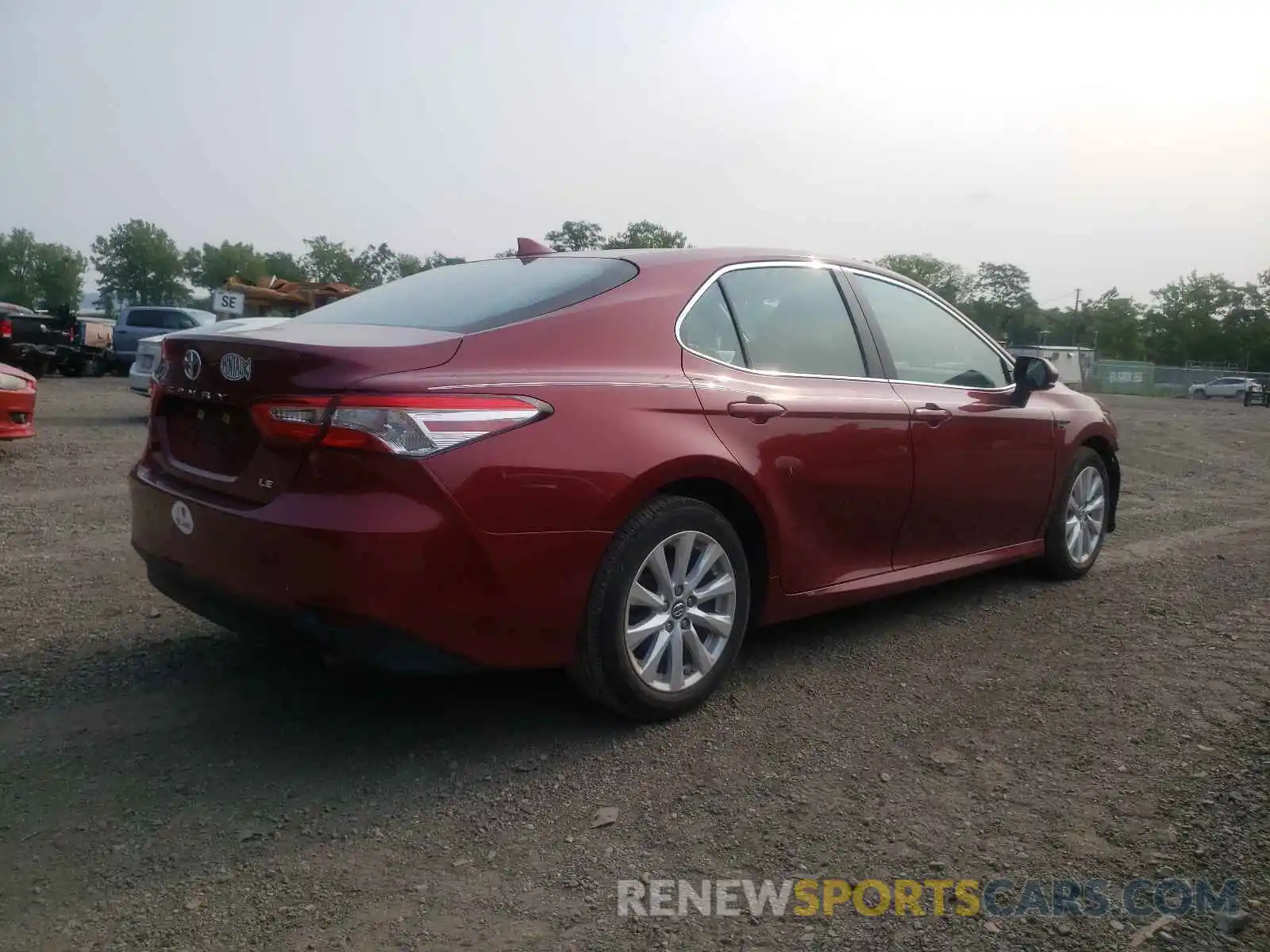 4 Photograph of a damaged car 4T1B11HK0KU760986 TOYOTA CAMRY 2019