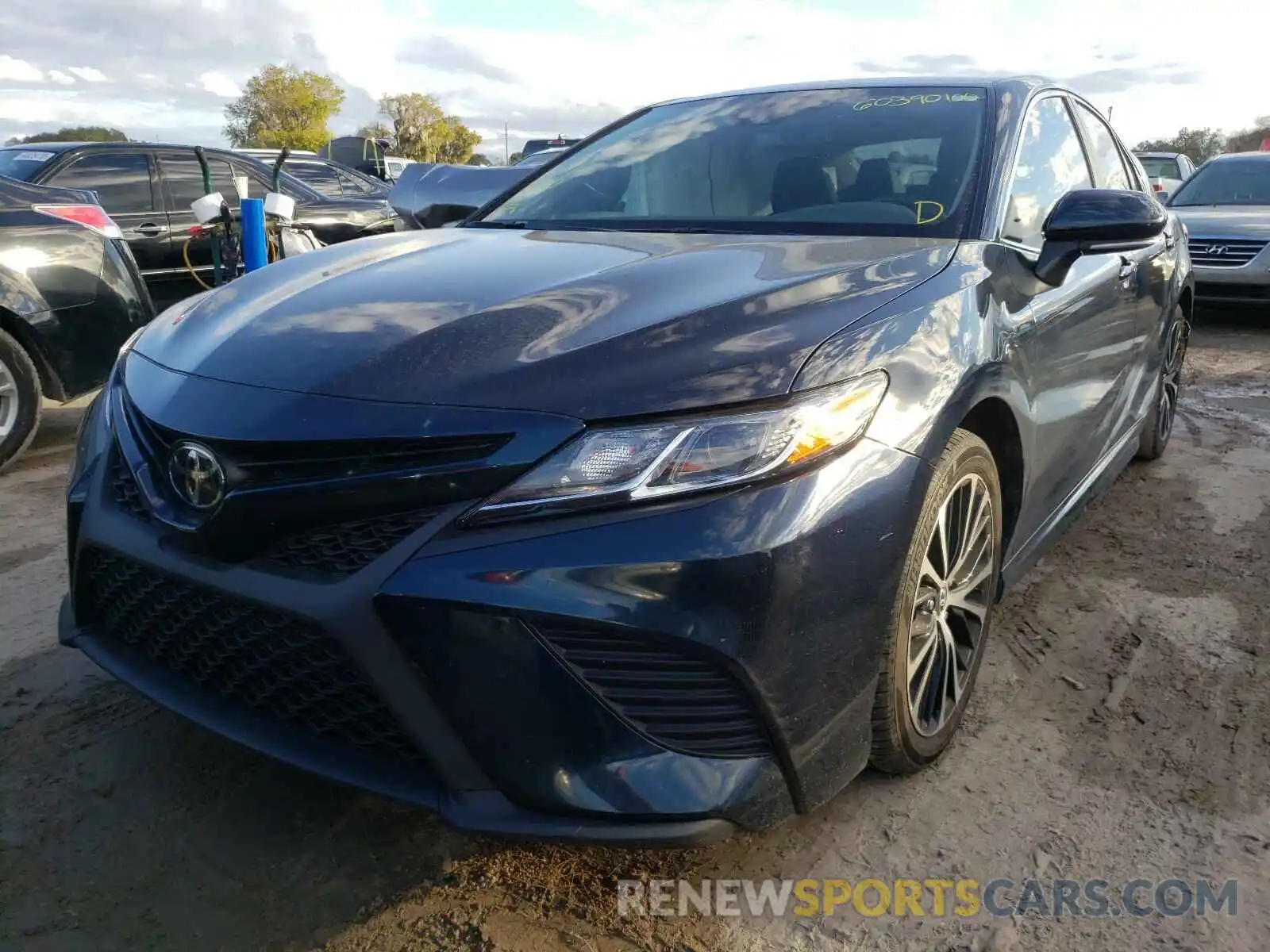 2 Photograph of a damaged car 4T1B11HK0KU761233 TOYOTA CAMRY 2019