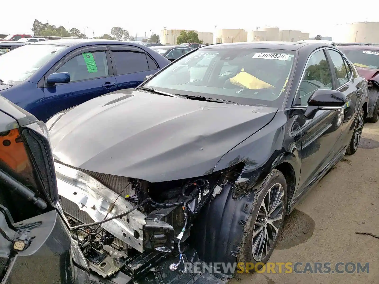 2 Photograph of a damaged car 4T1B11HK0KU761460 TOYOTA CAMRY 2019