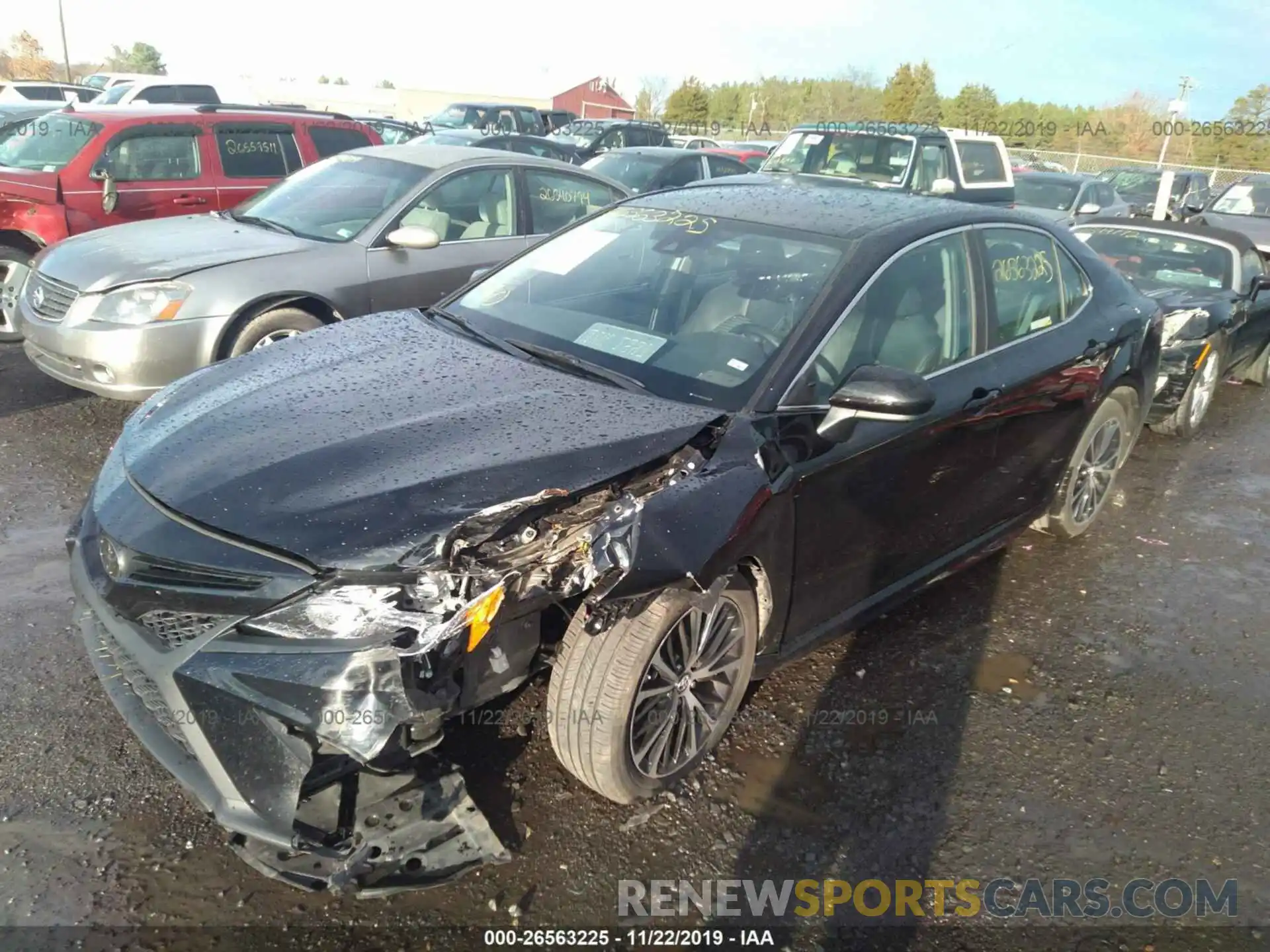 2 Photograph of a damaged car 4T1B11HK0KU764102 TOYOTA CAMRY 2019