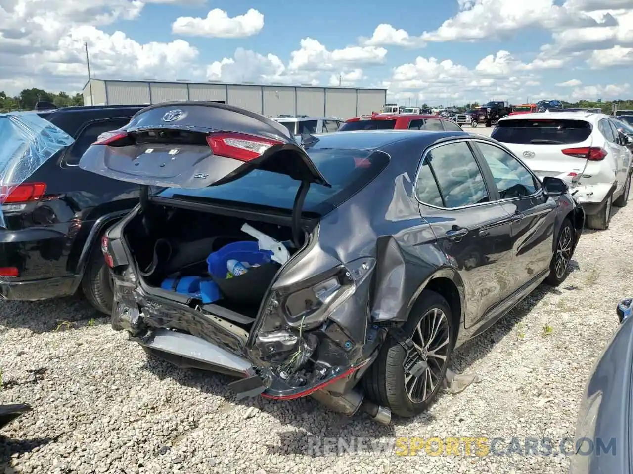 4 Photograph of a damaged car 4T1B11HK0KU765167 TOYOTA CAMRY 2019