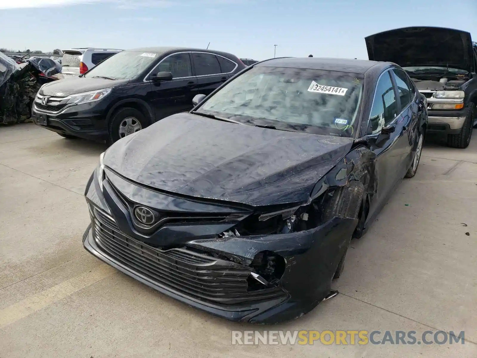 2 Photograph of a damaged car 4T1B11HK0KU765427 TOYOTA CAMRY 2019