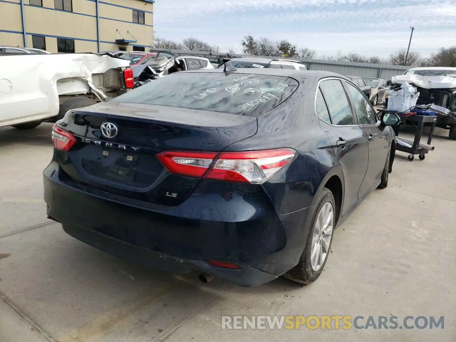 4 Photograph of a damaged car 4T1B11HK0KU765427 TOYOTA CAMRY 2019