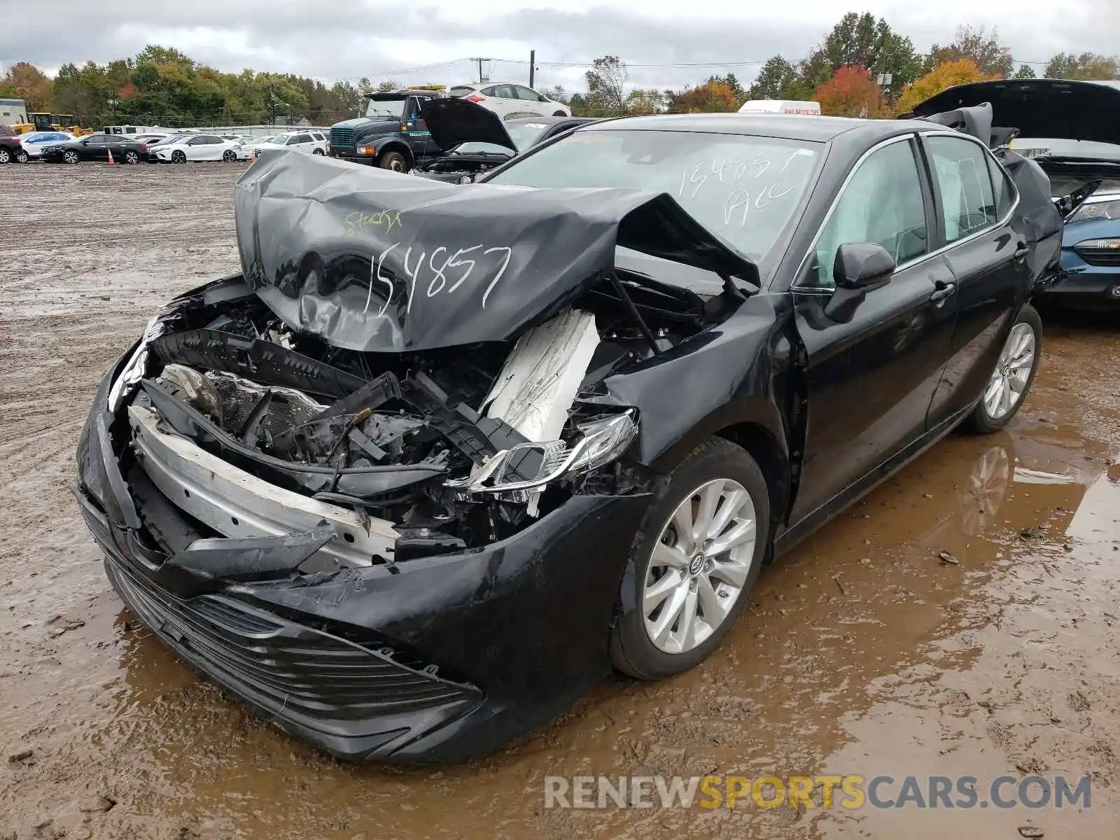 2 Photograph of a damaged car 4T1B11HK0KU767128 TOYOTA CAMRY 2019