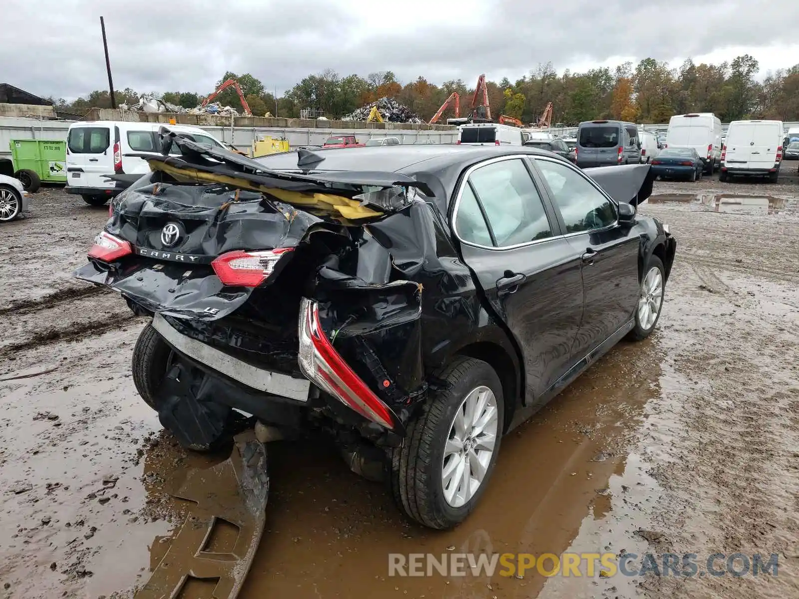 4 Photograph of a damaged car 4T1B11HK0KU767128 TOYOTA CAMRY 2019