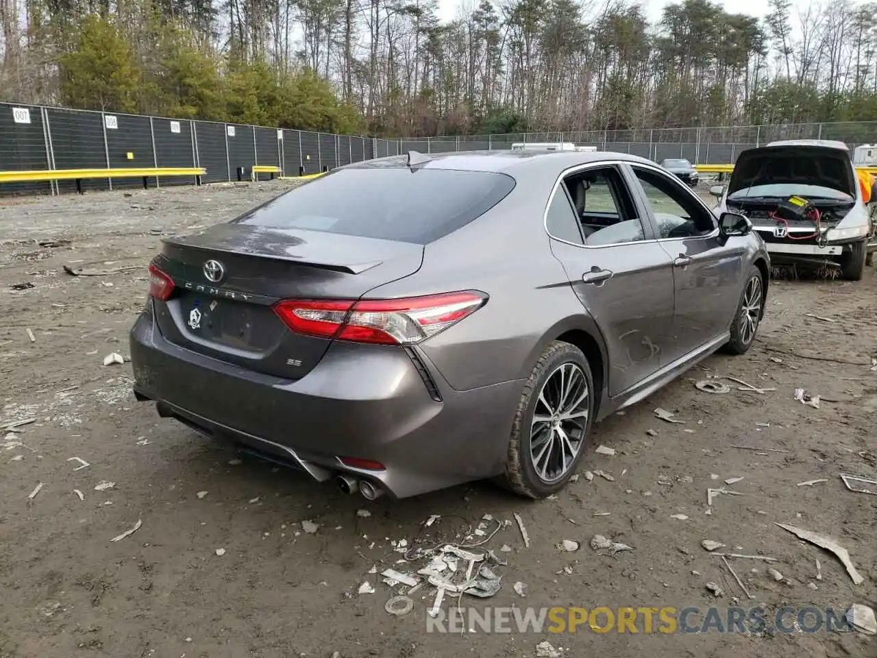 4 Photograph of a damaged car 4T1B11HK0KU767615 TOYOTA CAMRY 2019