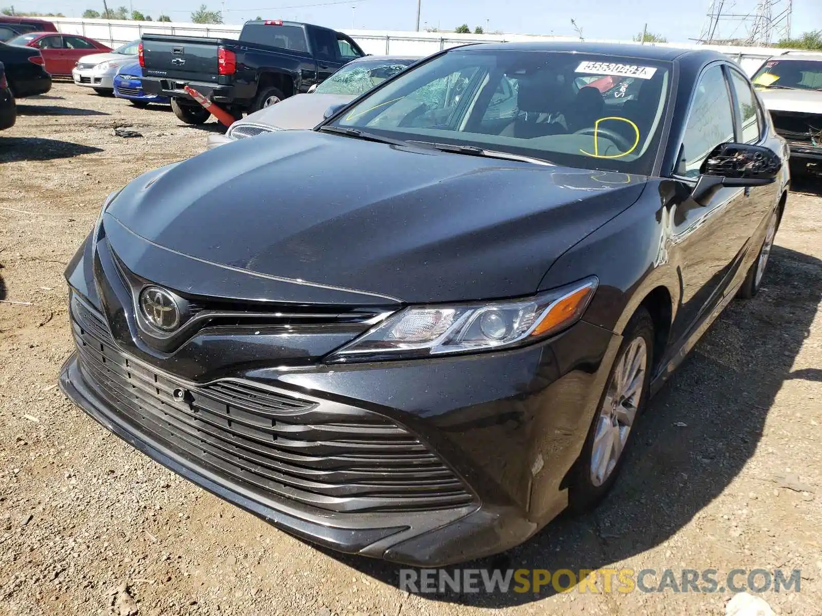 2 Photograph of a damaged car 4T1B11HK0KU767694 TOYOTA CAMRY 2019