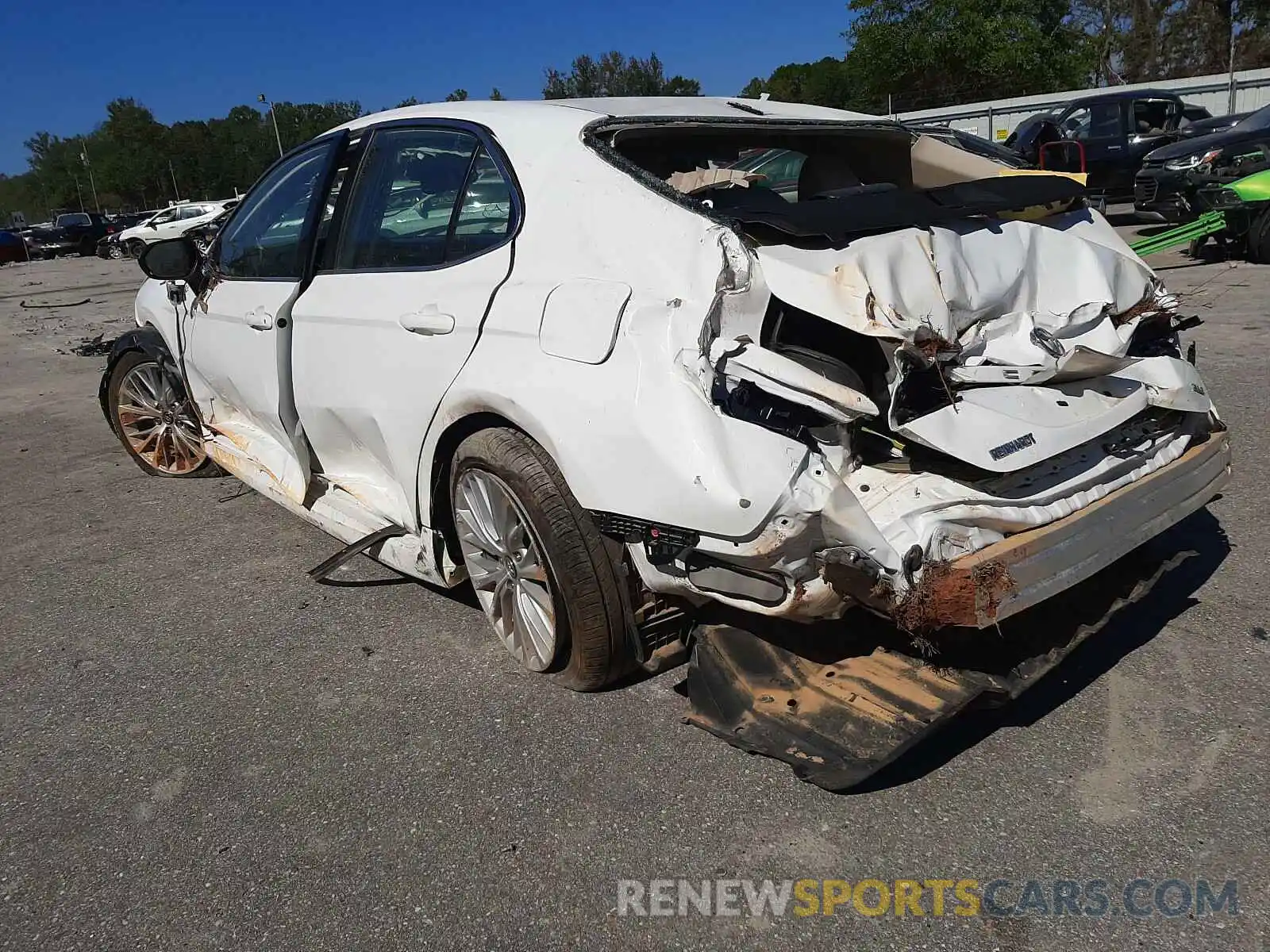 3 Photograph of a damaged car 4T1B11HK0KU768070 TOYOTA CAMRY 2019