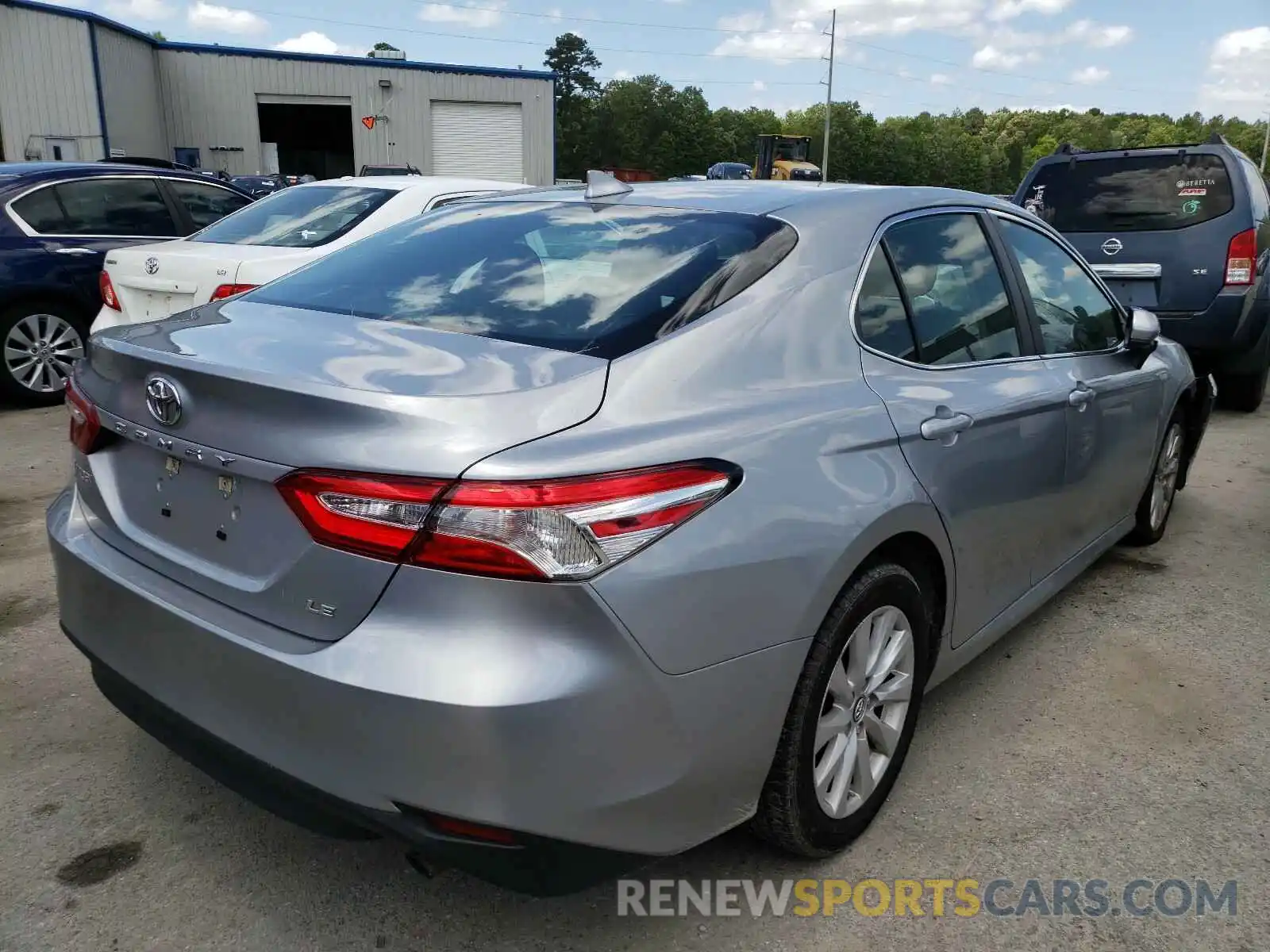 4 Photograph of a damaged car 4T1B11HK0KU768828 TOYOTA CAMRY 2019