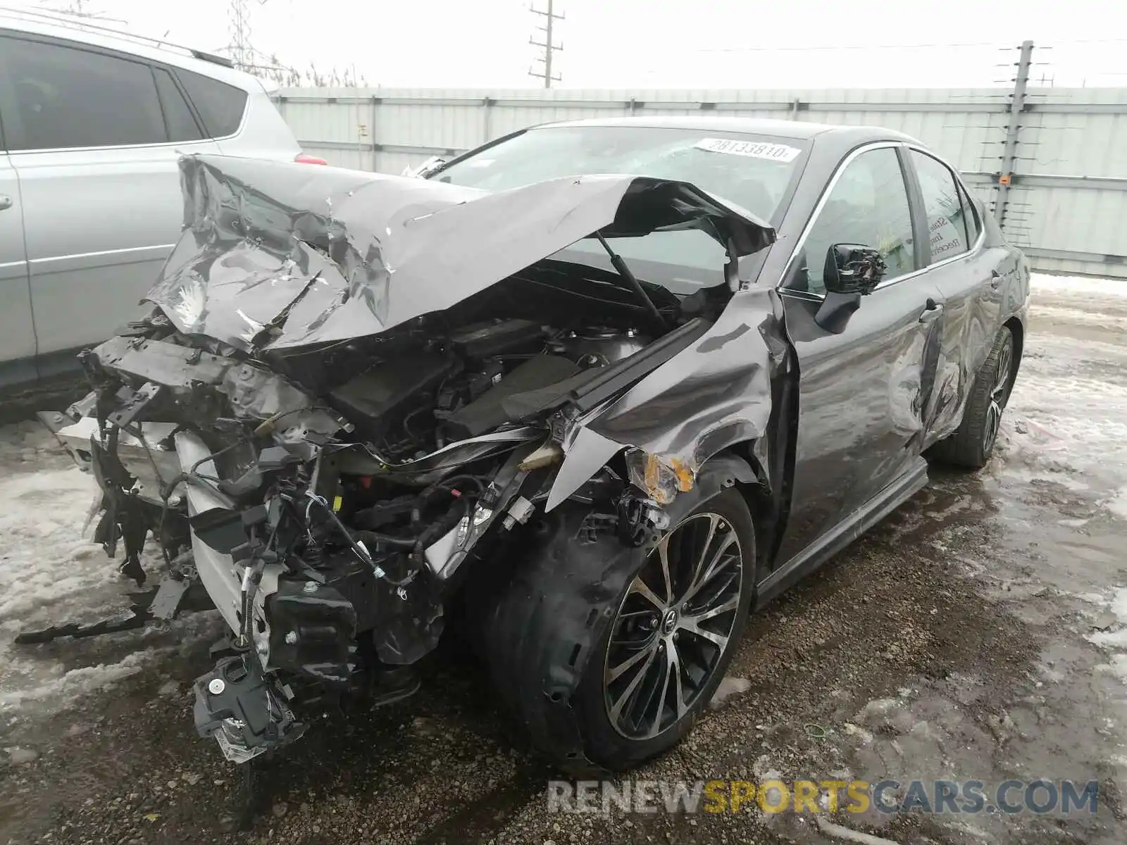 2 Photograph of a damaged car 4T1B11HK0KU769753 TOYOTA CAMRY 2019