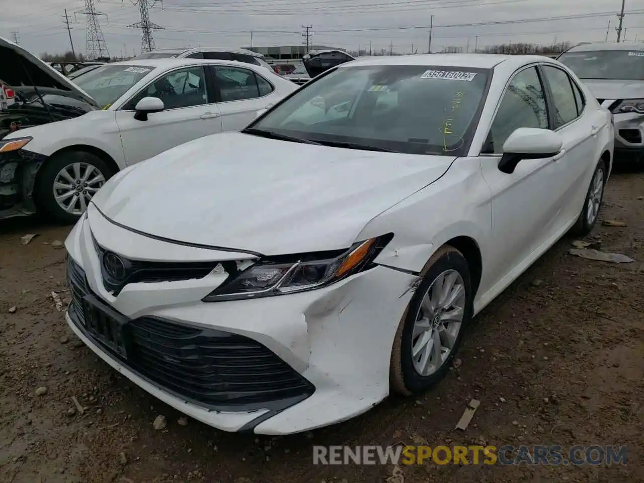 2 Photograph of a damaged car 4T1B11HK0KU770675 TOYOTA CAMRY 2019