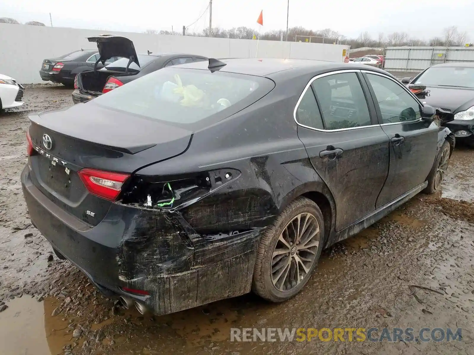 4 Photograph of a damaged car 4T1B11HK0KU770787 TOYOTA CAMRY 2019