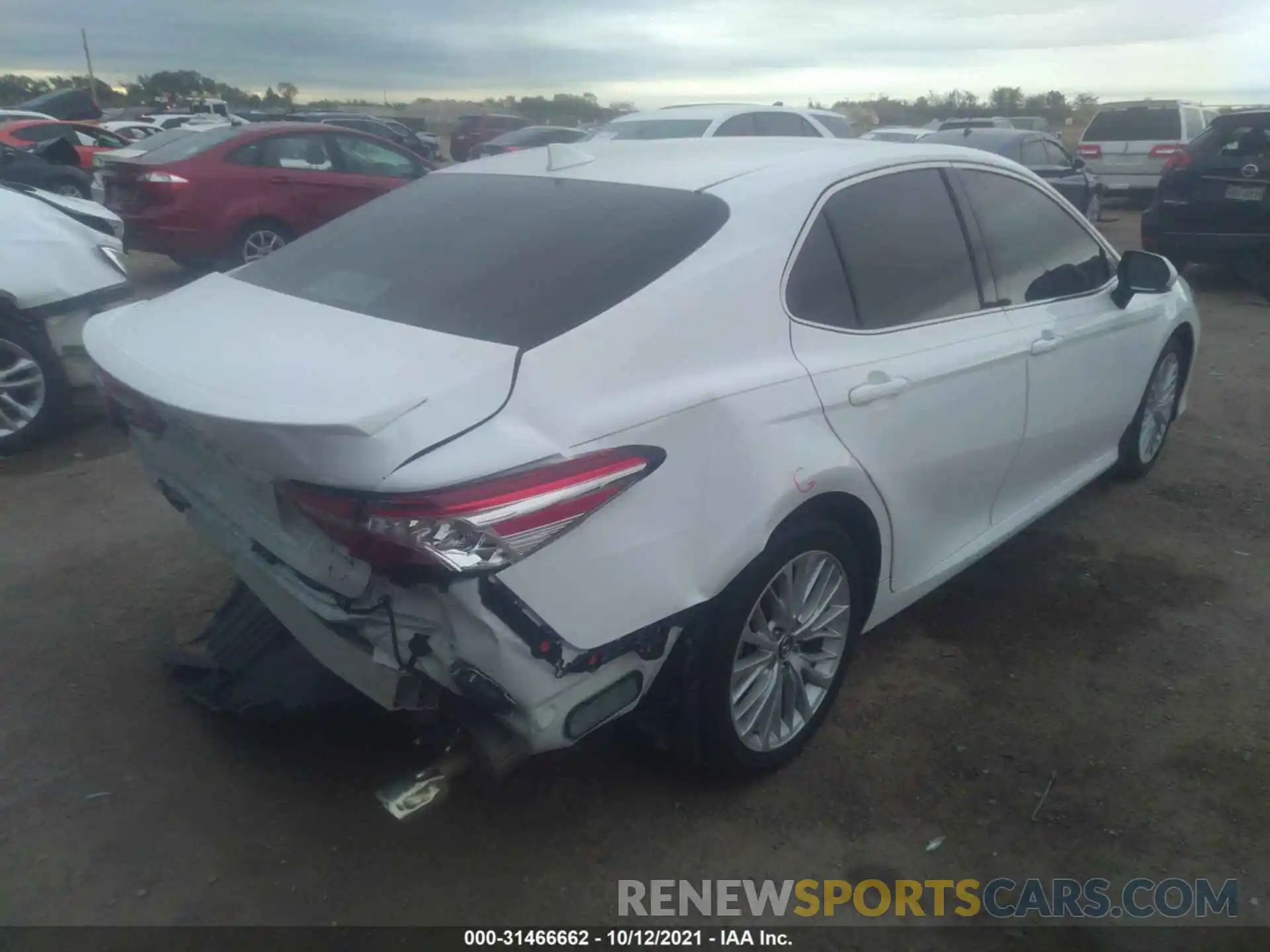 4 Photograph of a damaged car 4T1B11HK0KU772121 TOYOTA CAMRY 2019