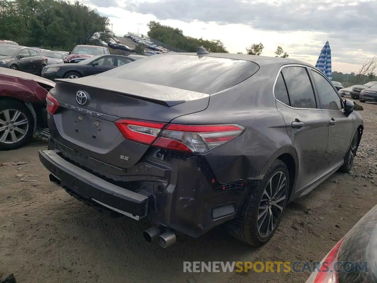 4 Photograph of a damaged car 4T1B11HK0KU773057 TOYOTA CAMRY 2019