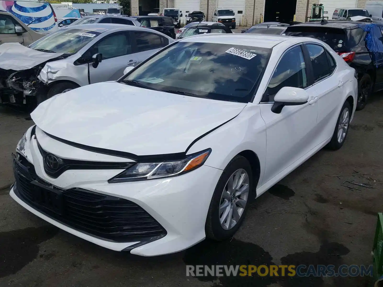 2 Photograph of a damaged car 4T1B11HK0KU774192 TOYOTA CAMRY 2019