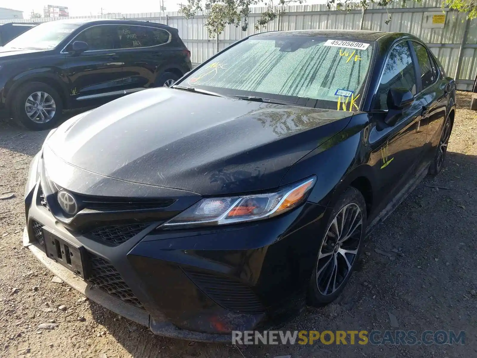 2 Photograph of a damaged car 4T1B11HK0KU774211 TOYOTA CAMRY 2019