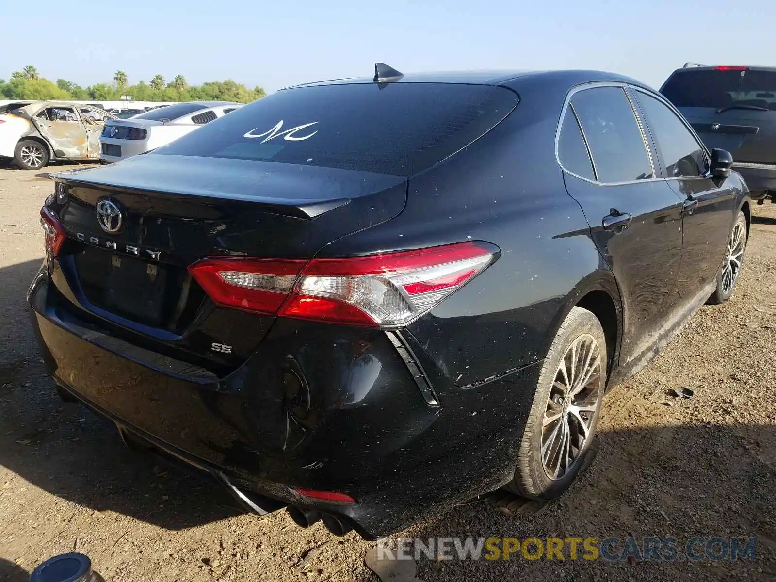 4 Photograph of a damaged car 4T1B11HK0KU774211 TOYOTA CAMRY 2019