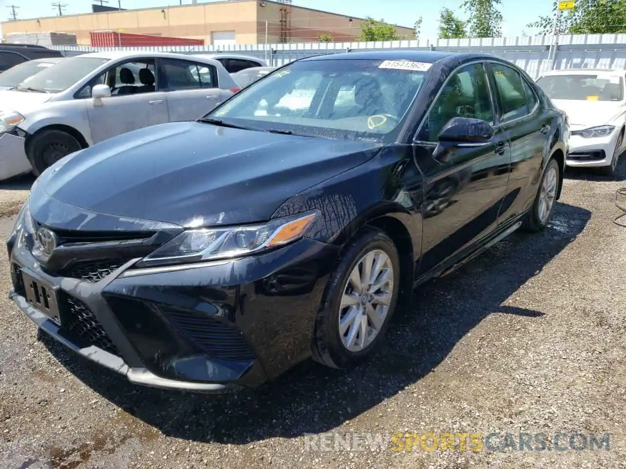 2 Photograph of a damaged car 4T1B11HK0KU774757 TOYOTA CAMRY 2019