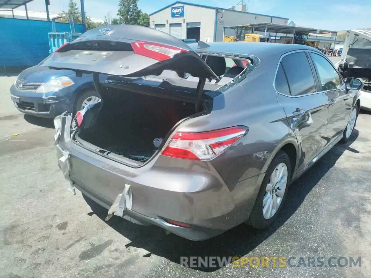 4 Photograph of a damaged car 4T1B11HK0KU775116 TOYOTA CAMRY 2019