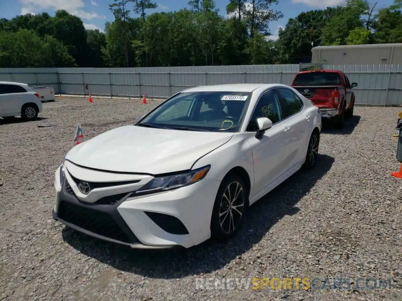 2 Photograph of a damaged car 4T1B11HK0KU777898 TOYOTA CAMRY 2019