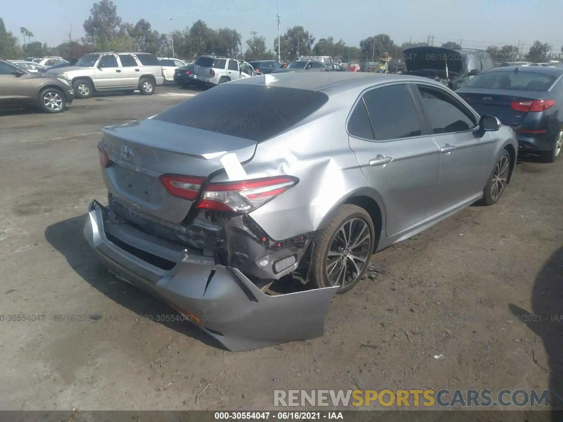 4 Photograph of a damaged car 4T1B11HK0KU777965 TOYOTA CAMRY 2019