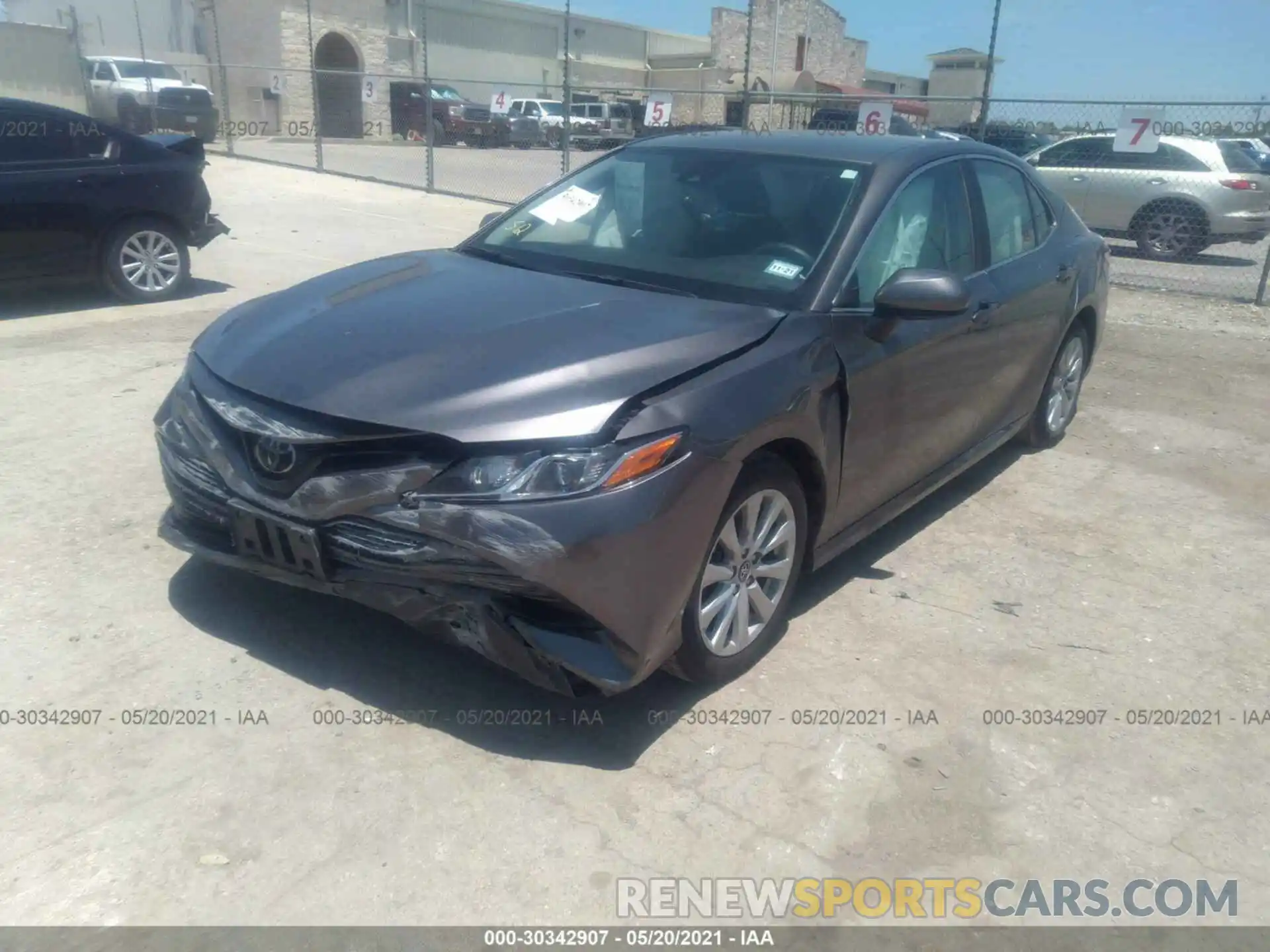 2 Photograph of a damaged car 4T1B11HK0KU778257 TOYOTA CAMRY 2019