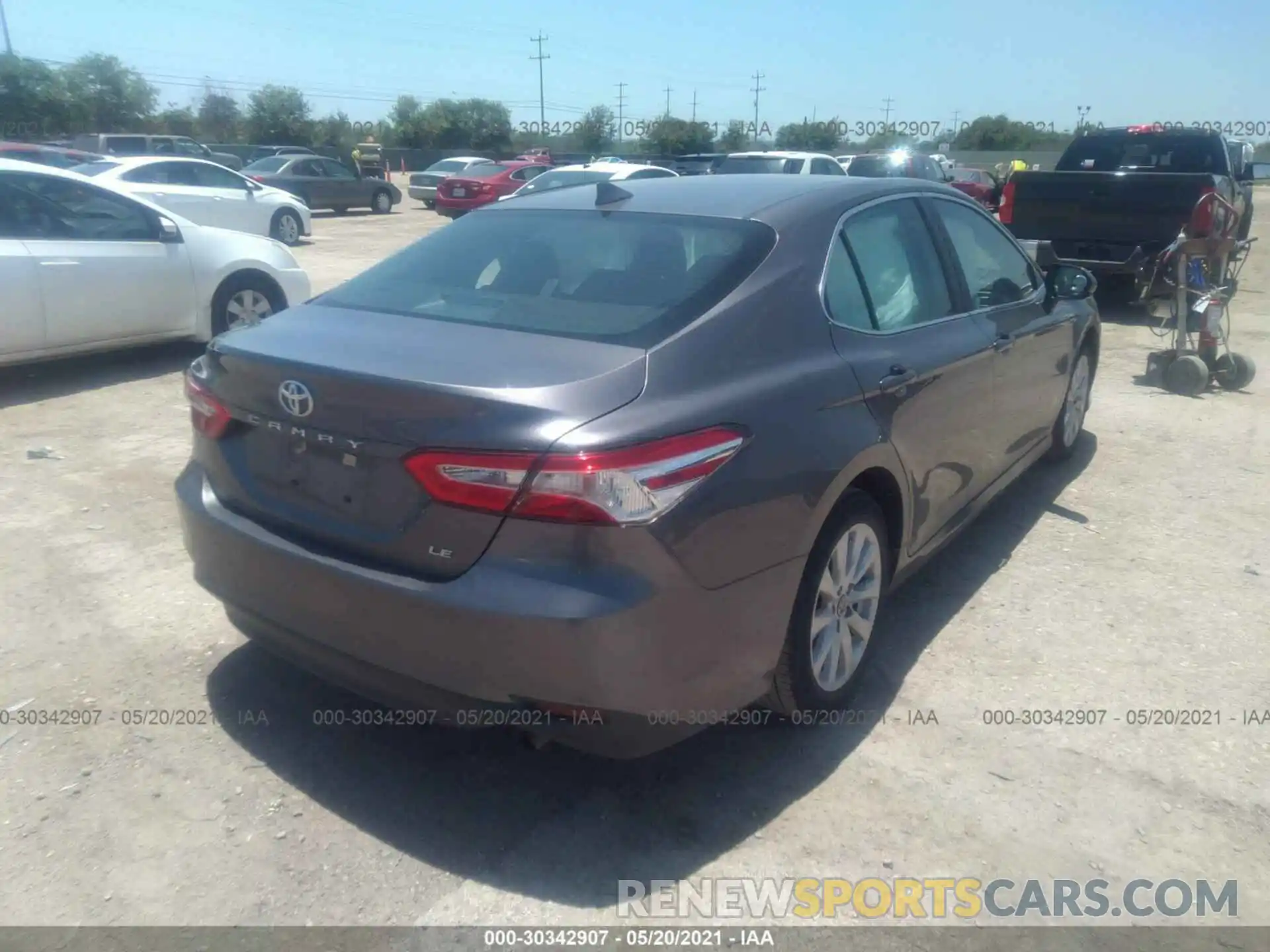 4 Photograph of a damaged car 4T1B11HK0KU778257 TOYOTA CAMRY 2019