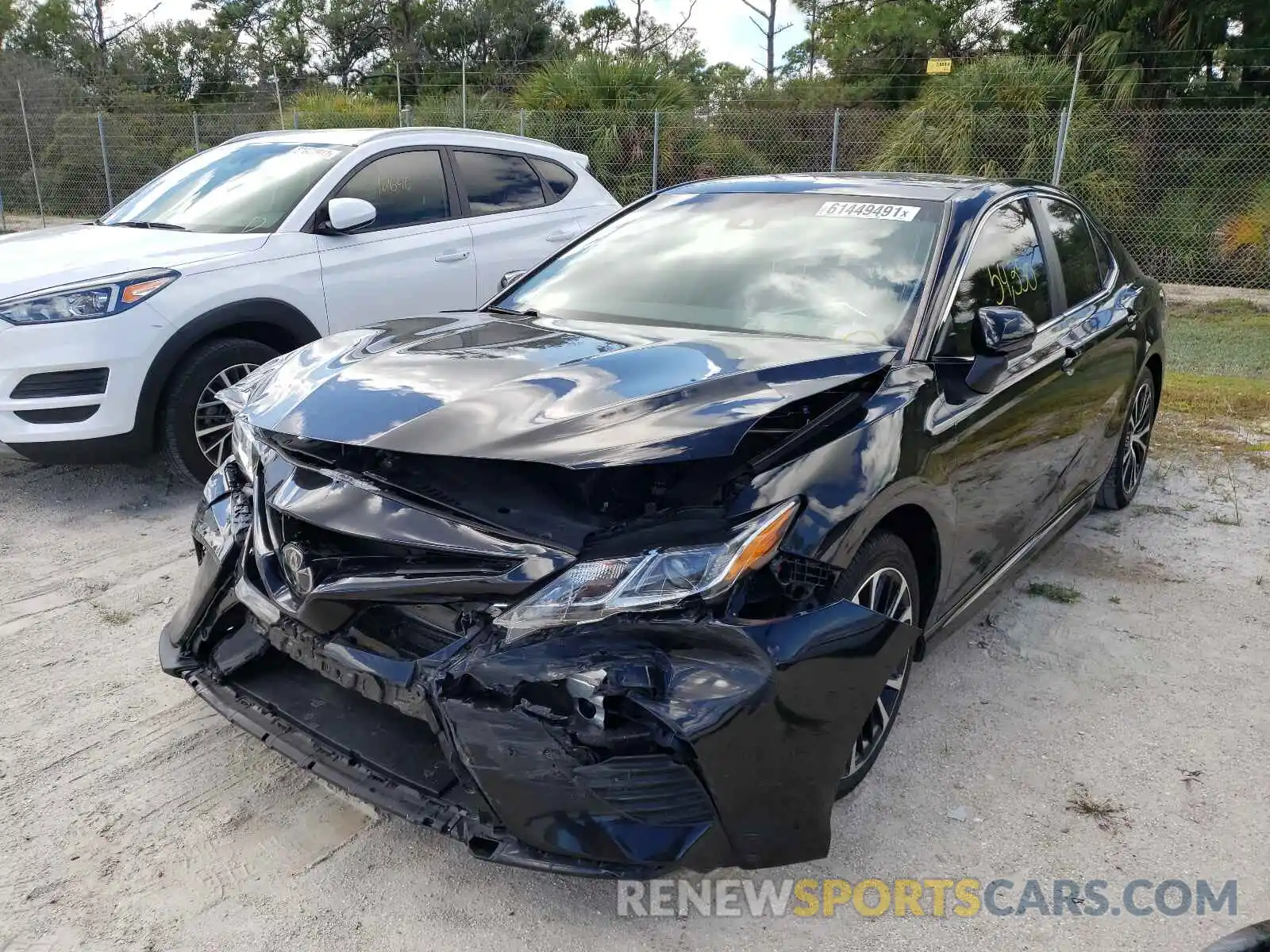 2 Photograph of a damaged car 4T1B11HK0KU778744 TOYOTA CAMRY 2019