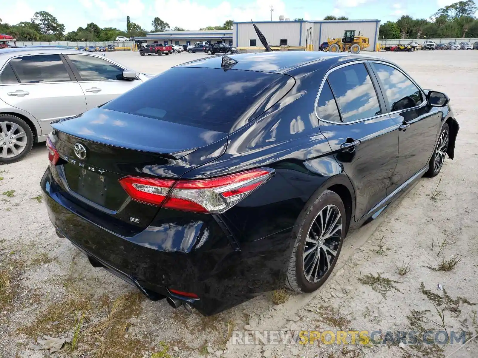 4 Photograph of a damaged car 4T1B11HK0KU778744 TOYOTA CAMRY 2019