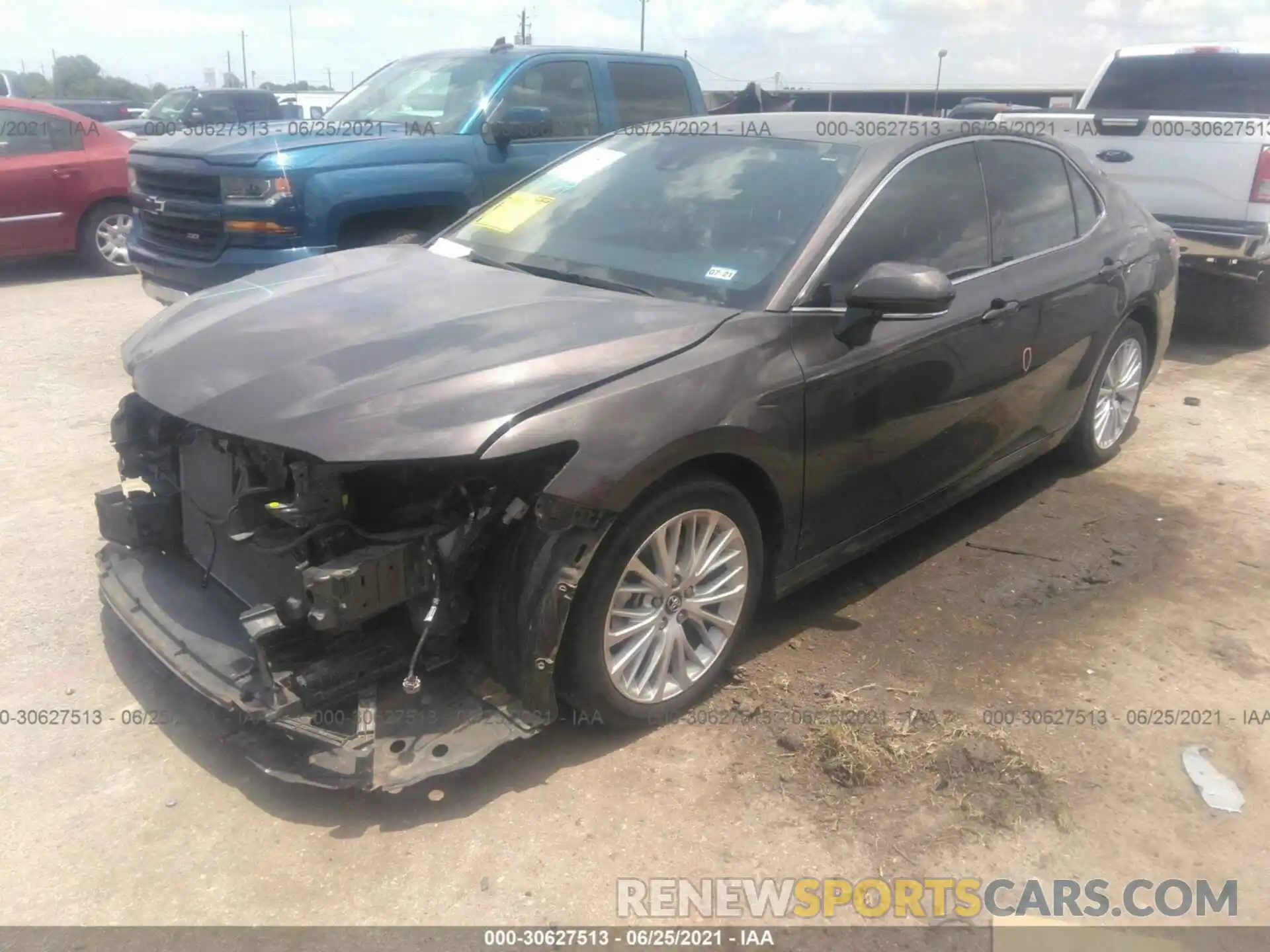 2 Photograph of a damaged car 4T1B11HK0KU779165 TOYOTA CAMRY 2019