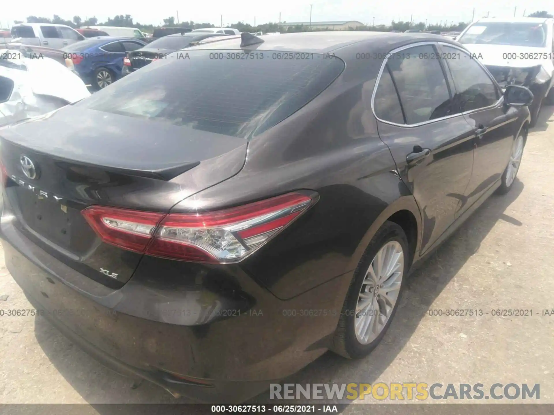 4 Photograph of a damaged car 4T1B11HK0KU779165 TOYOTA CAMRY 2019