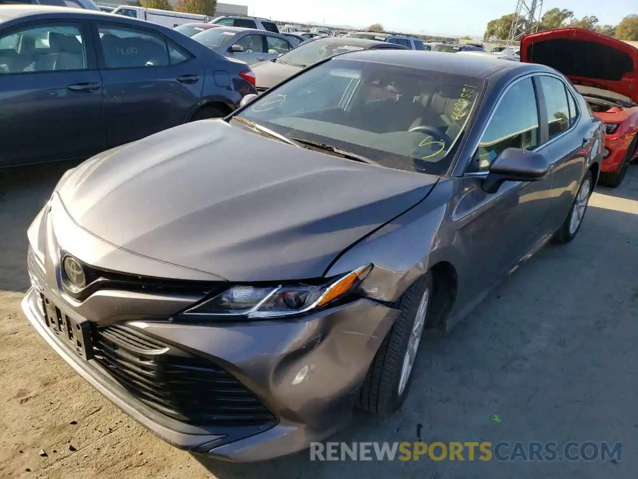 2 Photograph of a damaged car 4T1B11HK0KU779568 TOYOTA CAMRY 2019