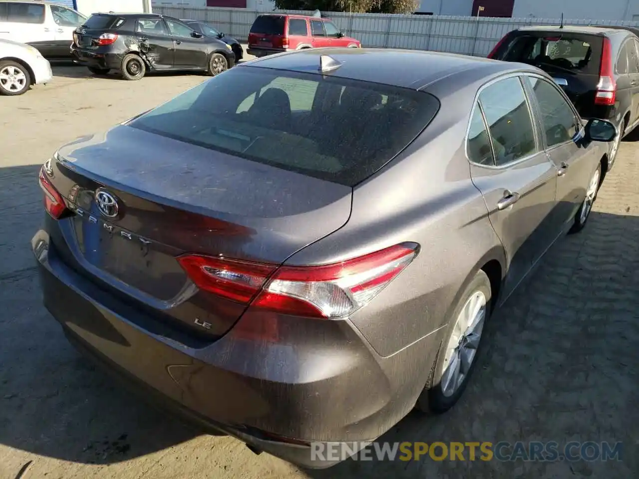 4 Photograph of a damaged car 4T1B11HK0KU779568 TOYOTA CAMRY 2019