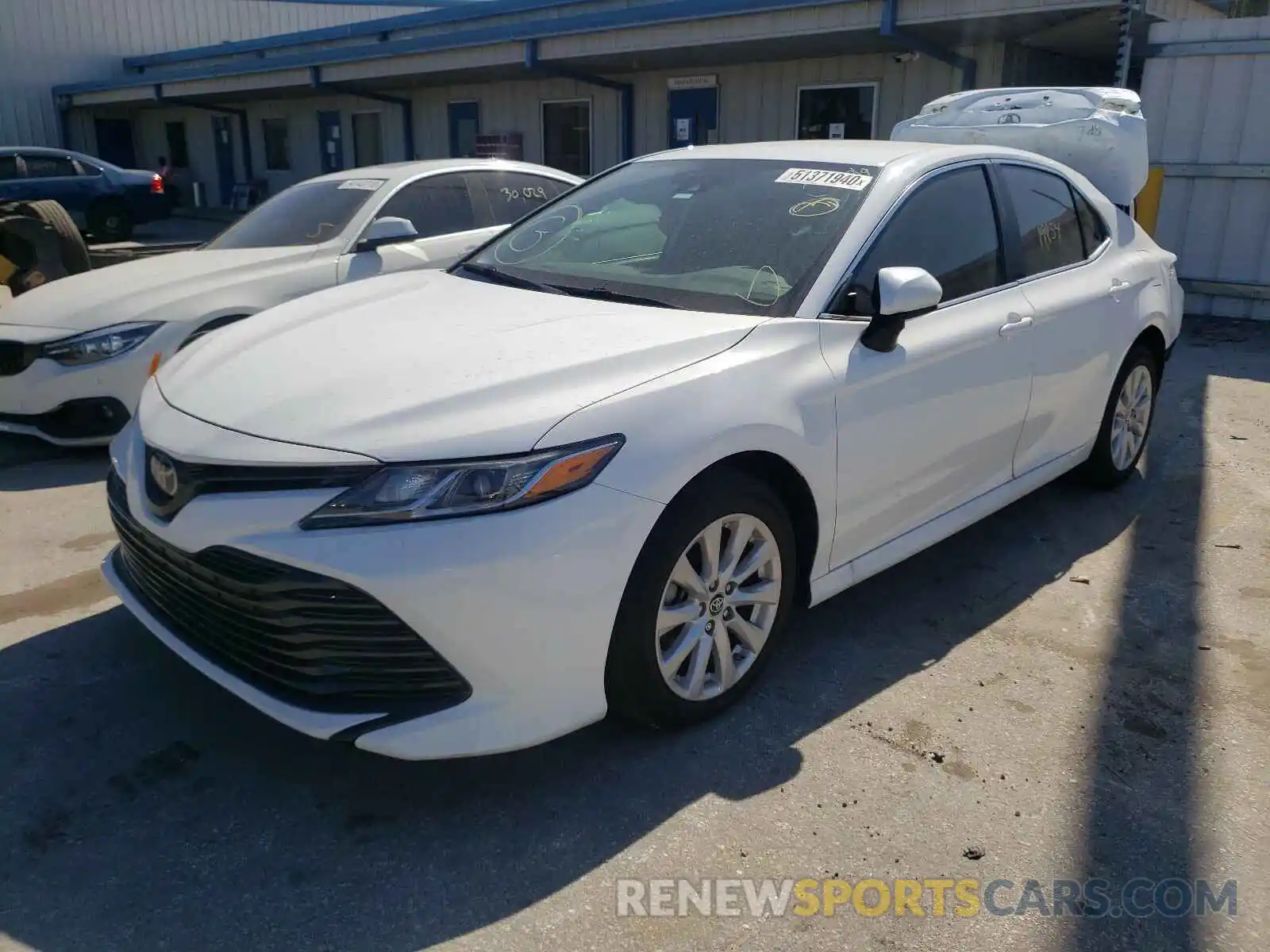 2 Photograph of a damaged car 4T1B11HK0KU780820 TOYOTA CAMRY 2019