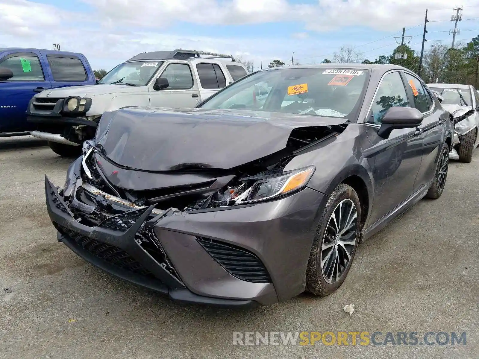 2 Photograph of a damaged car 4T1B11HK0KU780915 TOYOTA CAMRY 2019