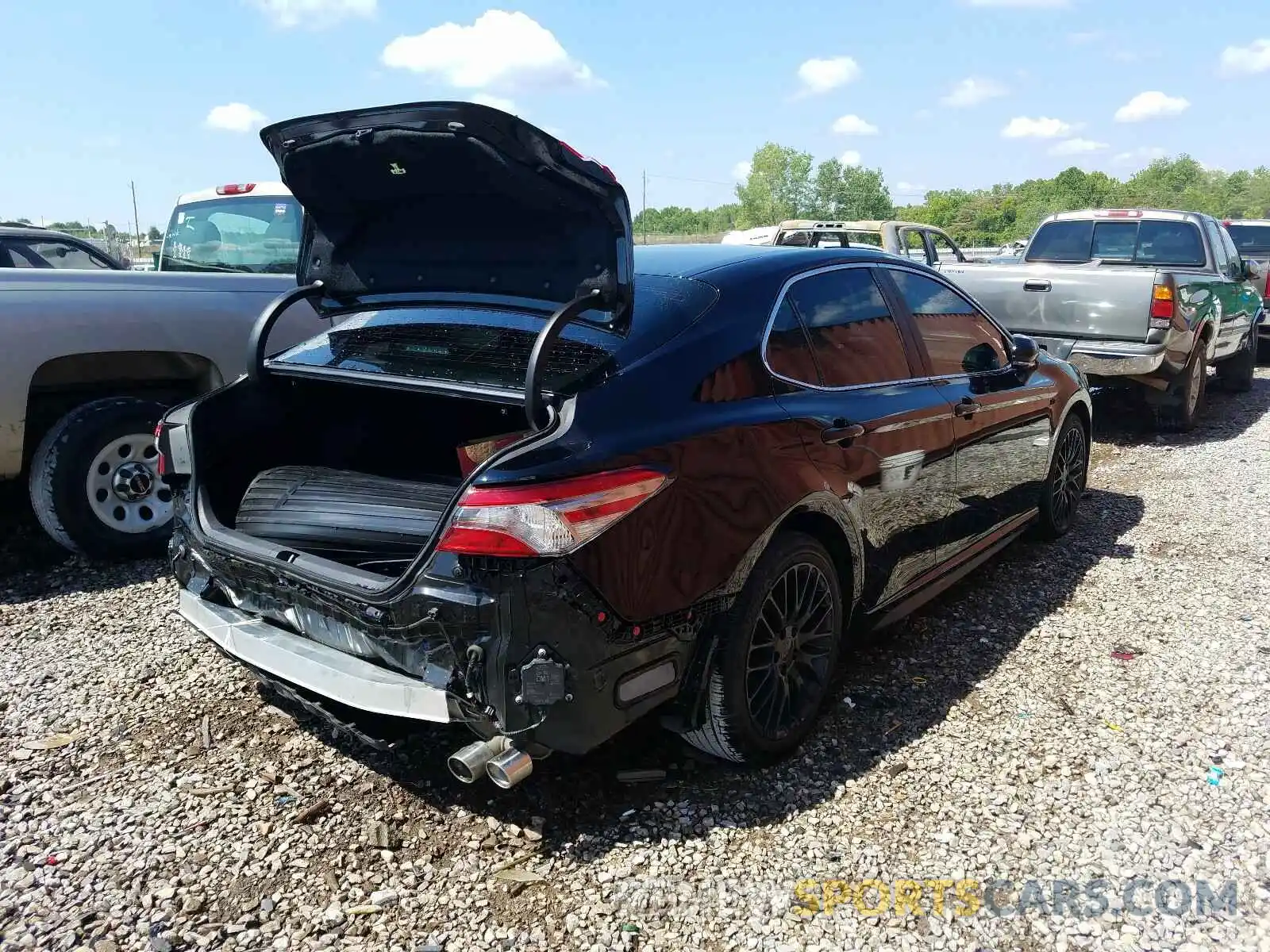 4 Photograph of a damaged car 4T1B11HK0KU782373 TOYOTA CAMRY 2019