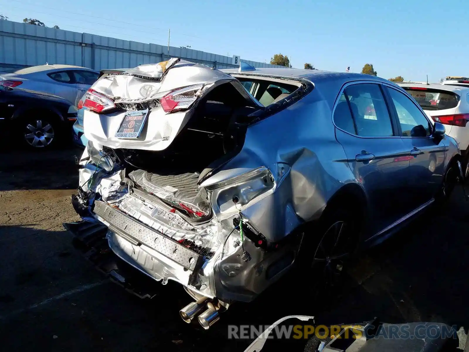 4 Photograph of a damaged car 4T1B11HK0KU783359 TOYOTA CAMRY 2019