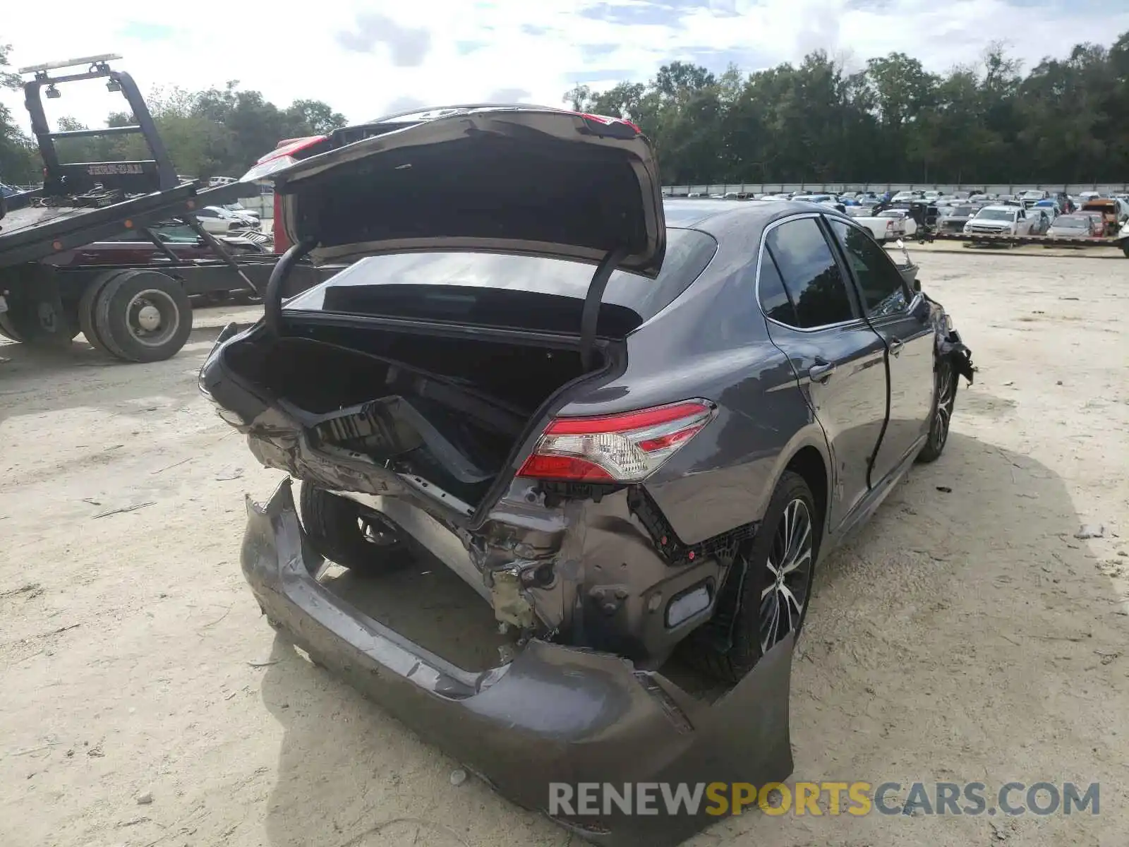 4 Photograph of a damaged car 4T1B11HK0KU784219 TOYOTA CAMRY 2019