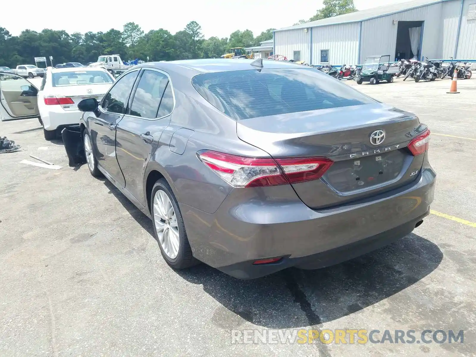 3 Photograph of a damaged car 4T1B11HK0KU784351 TOYOTA CAMRY 2019