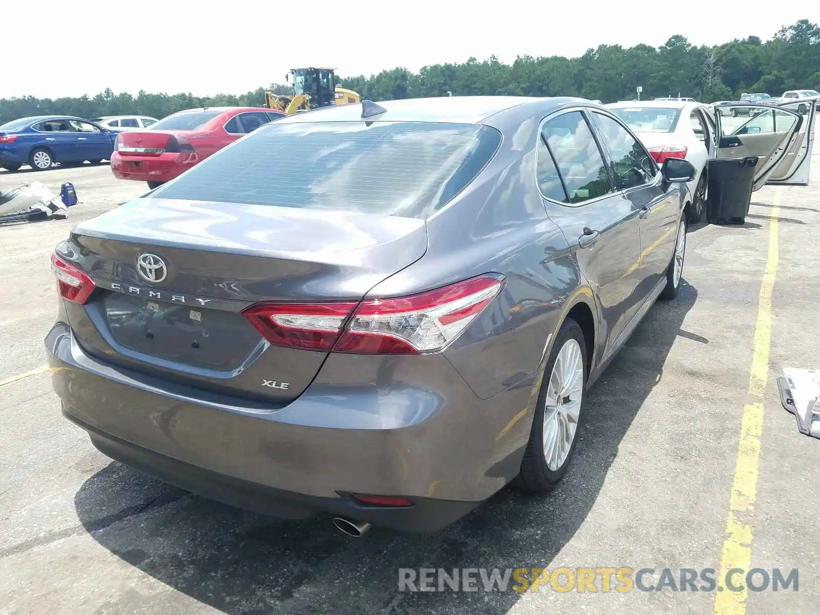 4 Photograph of a damaged car 4T1B11HK0KU784351 TOYOTA CAMRY 2019