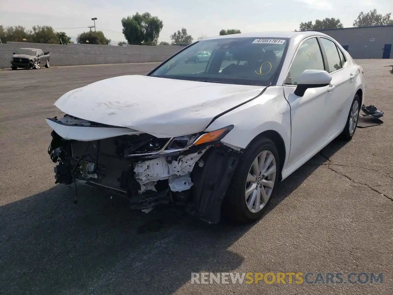 2 Photograph of a damaged car 4T1B11HK0KU784754 TOYOTA CAMRY 2019