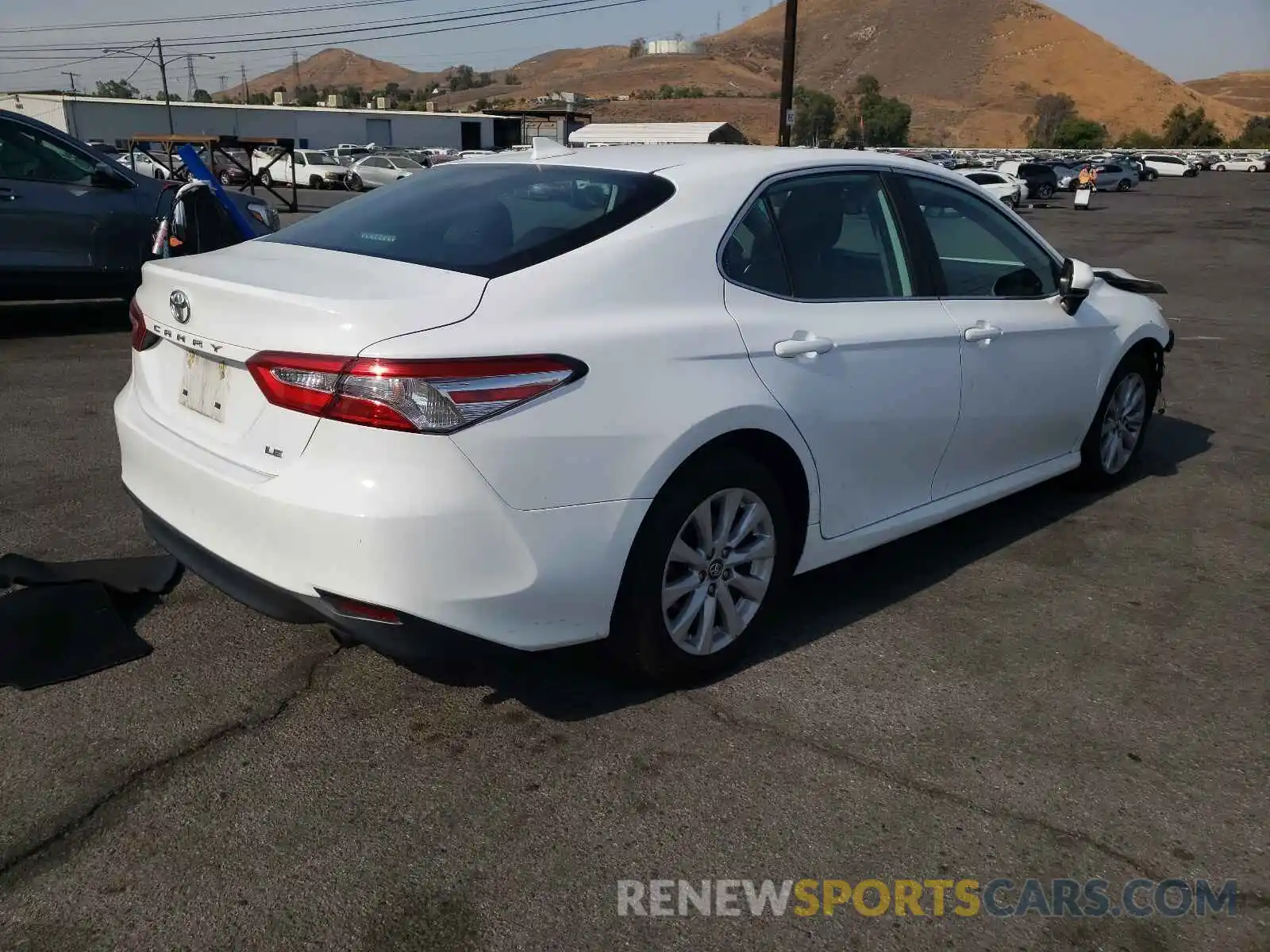 4 Photograph of a damaged car 4T1B11HK0KU784754 TOYOTA CAMRY 2019