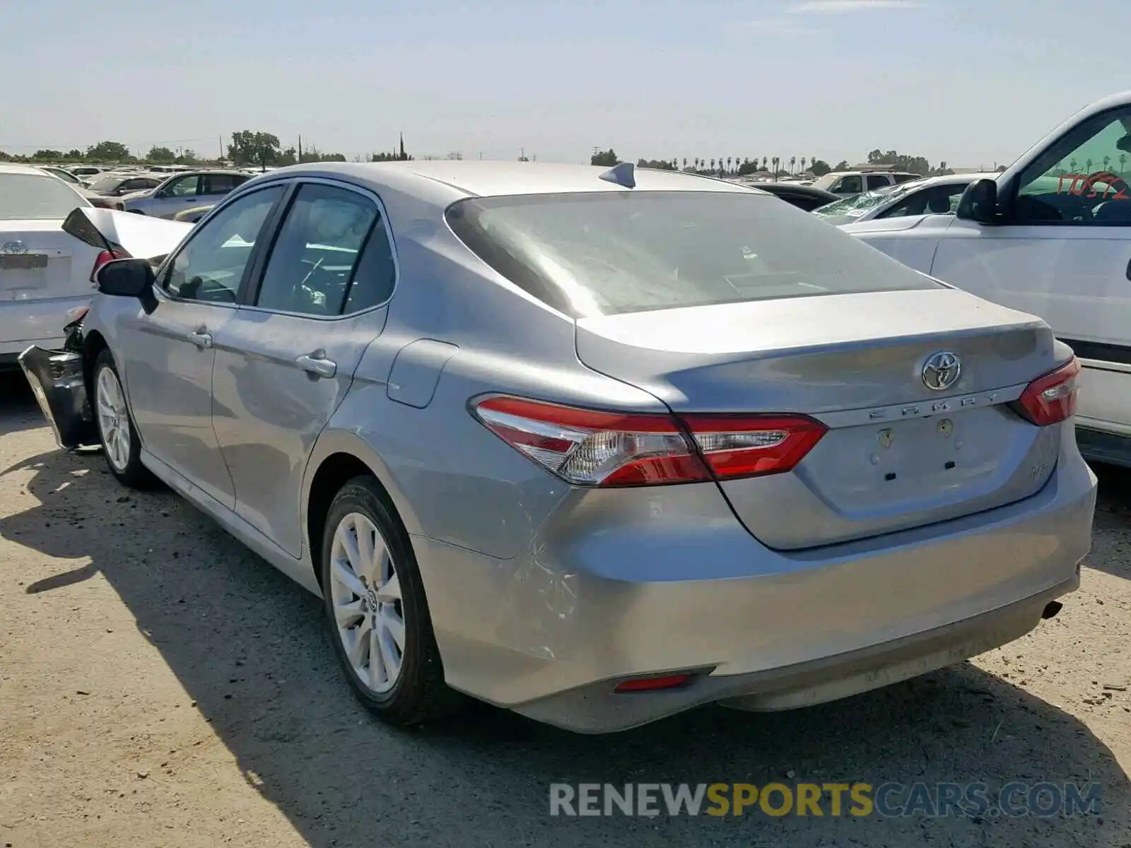 3 Photograph of a damaged car 4T1B11HK0KU785645 TOYOTA CAMRY 2019