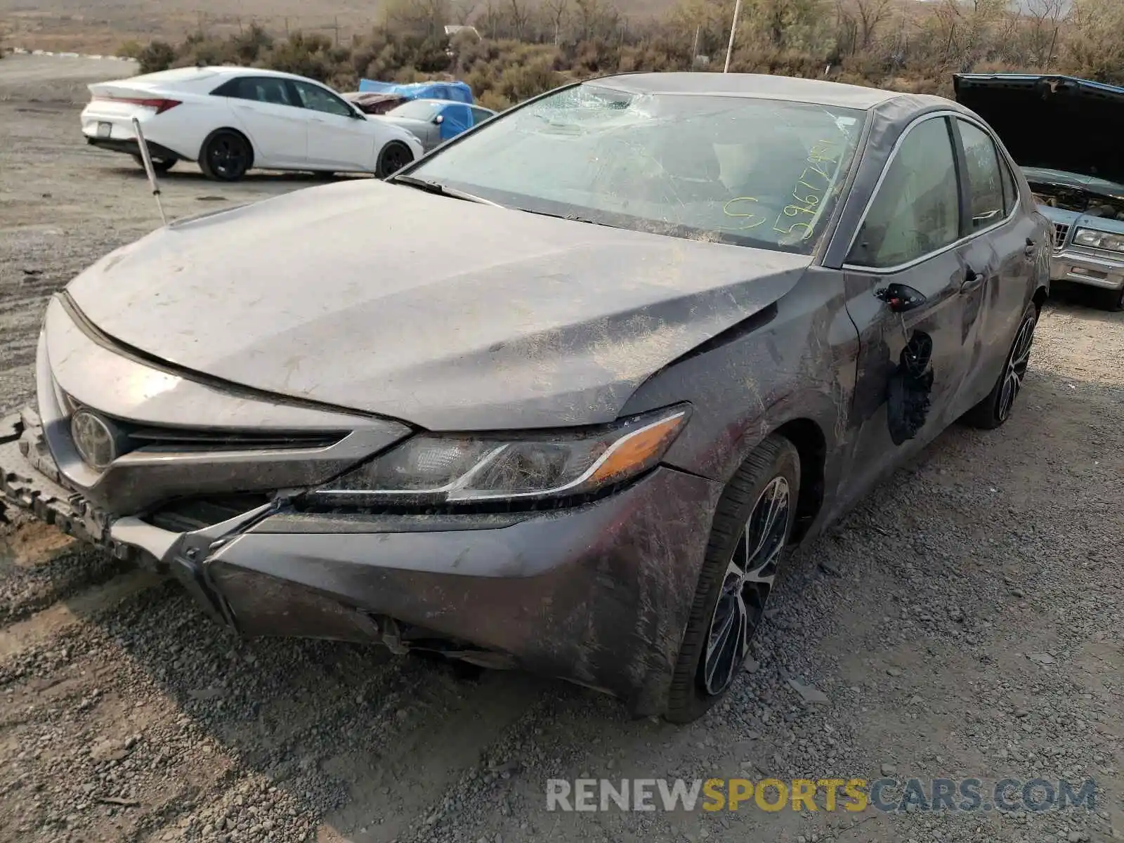 2 Photograph of a damaged car 4T1B11HK0KU786374 TOYOTA CAMRY 2019