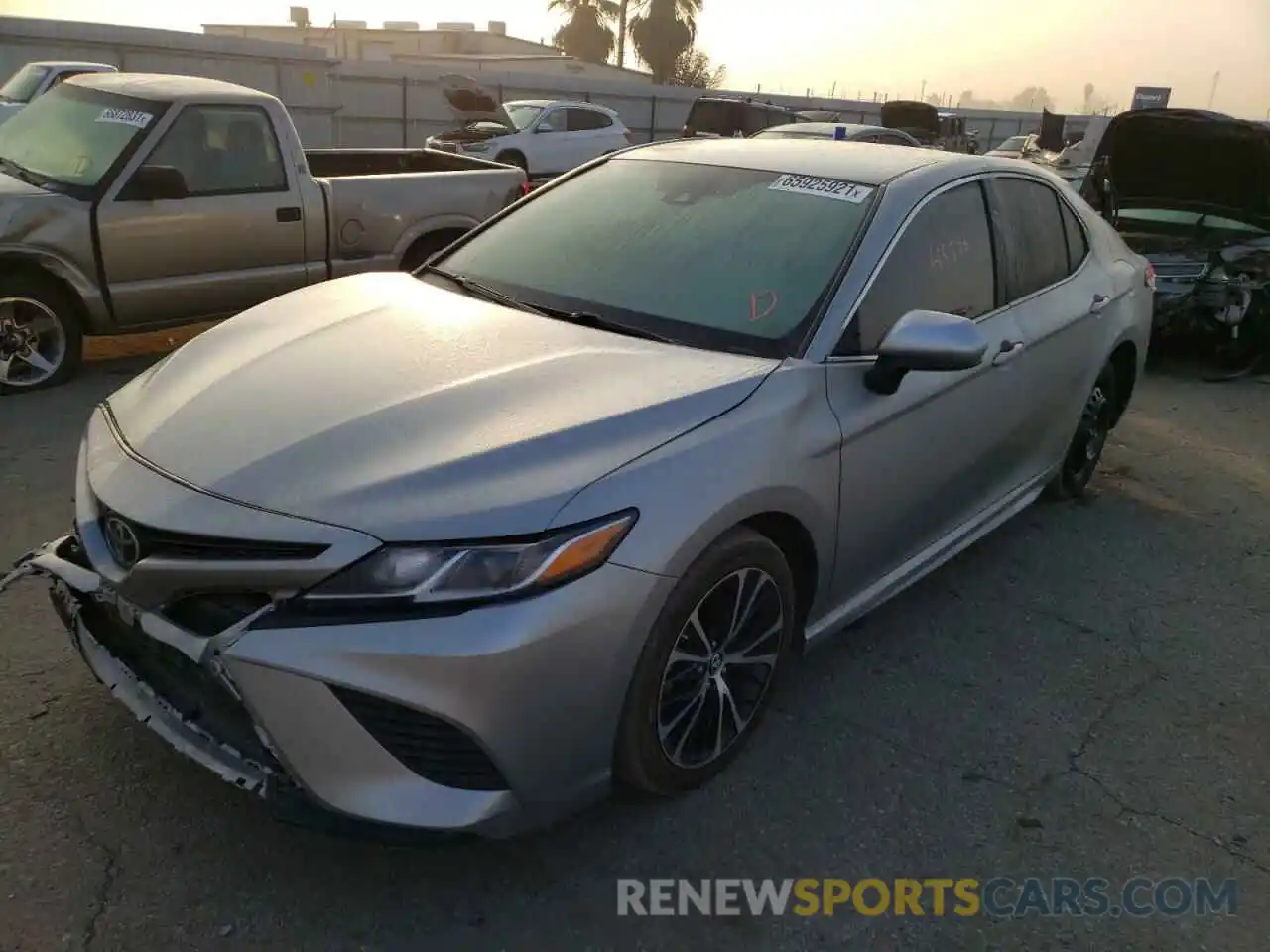 2 Photograph of a damaged car 4T1B11HK0KU787153 TOYOTA CAMRY 2019